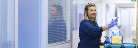 Dollarphotoclub 47260731 smaller 470x163 - Portrait of happy professional female cleaner smiling in office
